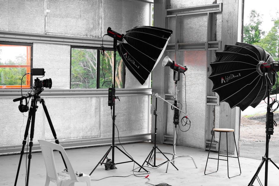 Indoor photography studio with lighting equipment and camera in Sydney.
